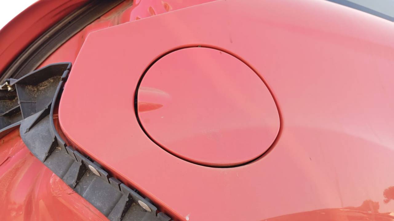 TAPA EXTERIOR COMBUSTIBLE