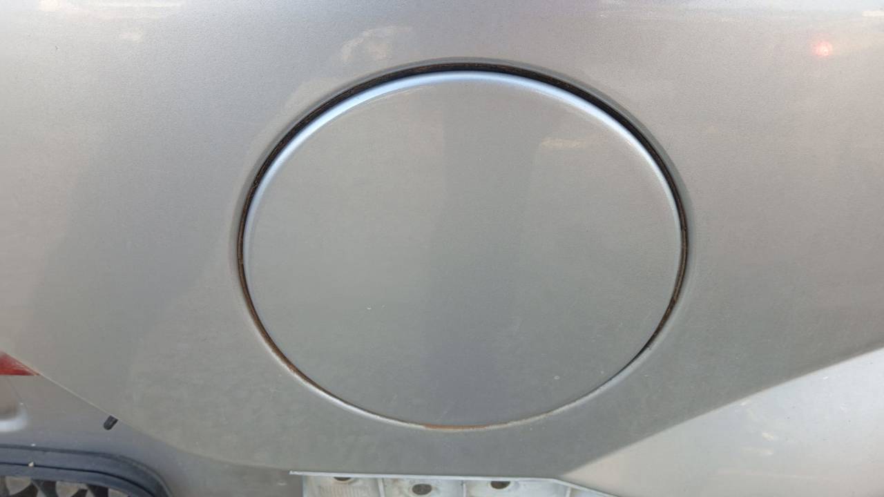 TAPA EXTERIOR COMBUSTIBLE