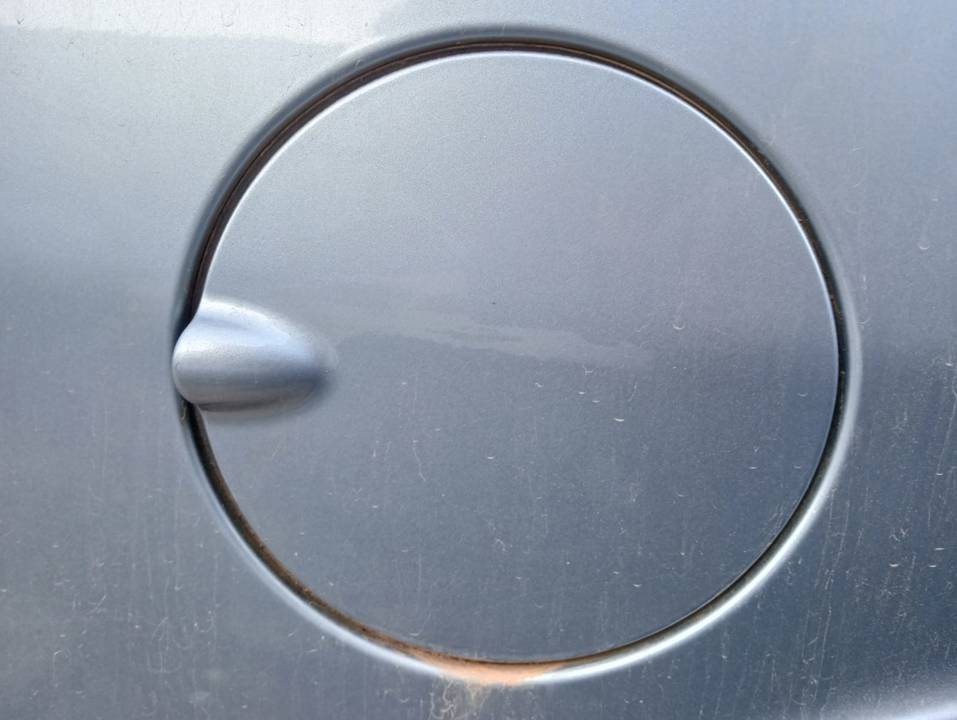TAPA EXTERIOR COMBUSTIBLE
