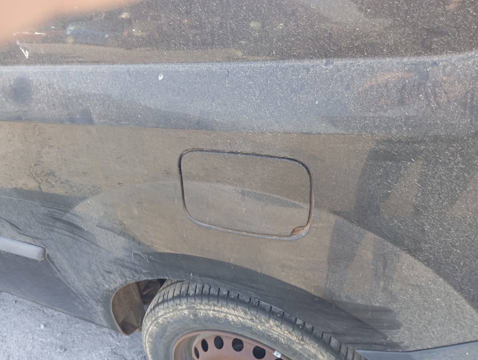 TAPA EXTERIOR COMBUSTIBLE