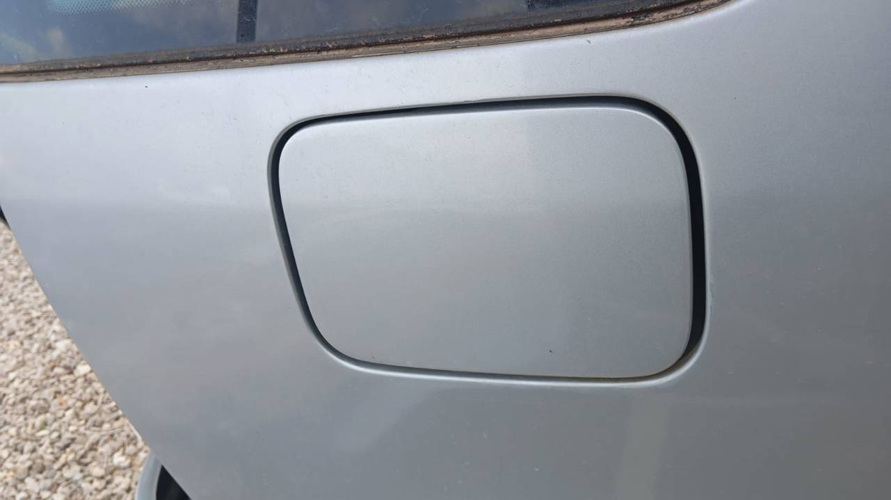 TAPA EXTERIOR COMBUSTIBLE