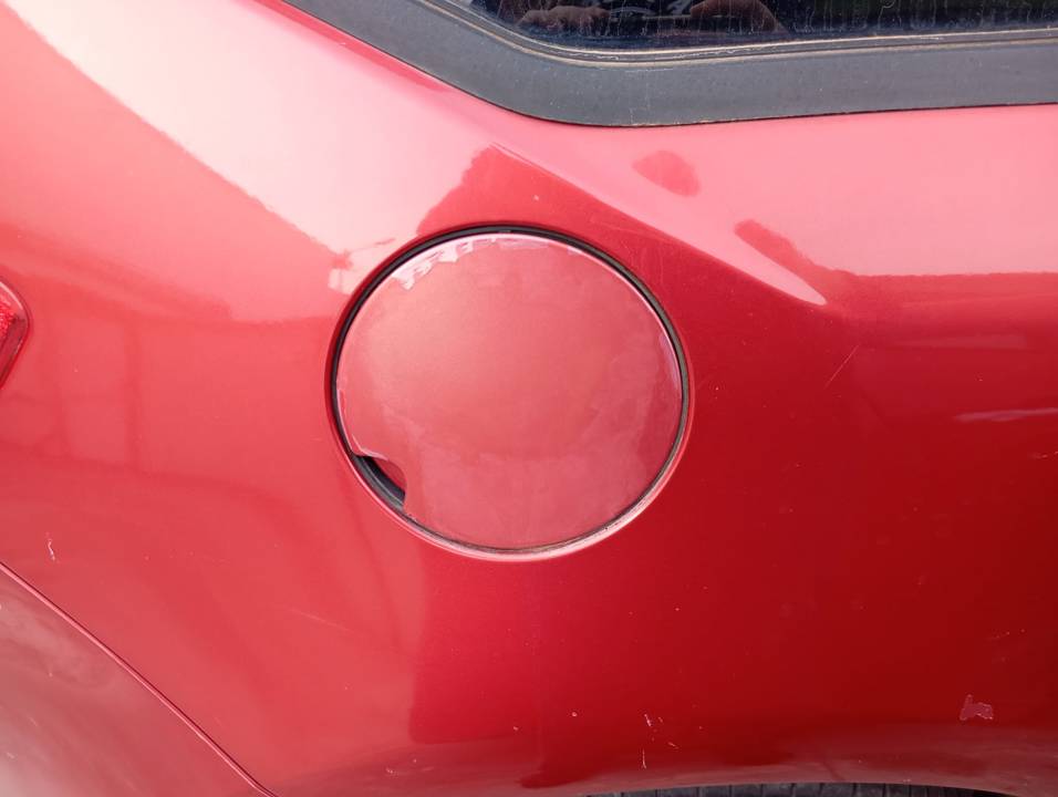TAPA EXTERIOR COMBUSTIBLE