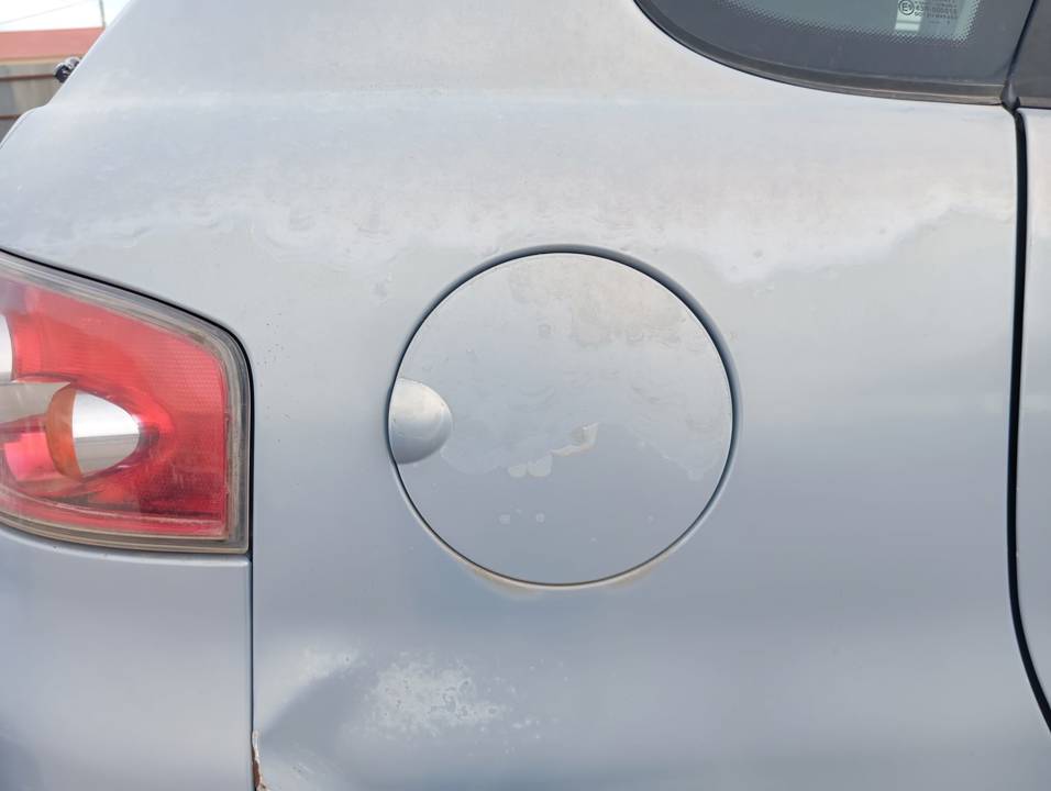 TAPA EXTERIOR COMBUSTIBLE
