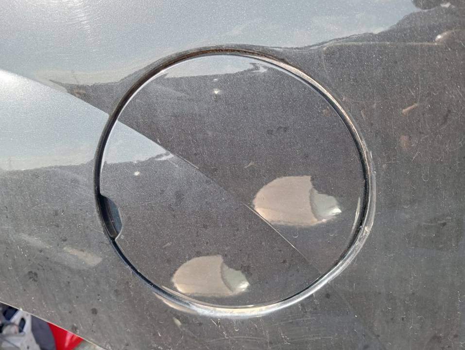 TAPA EXTERIOR COMBUSTIBLE