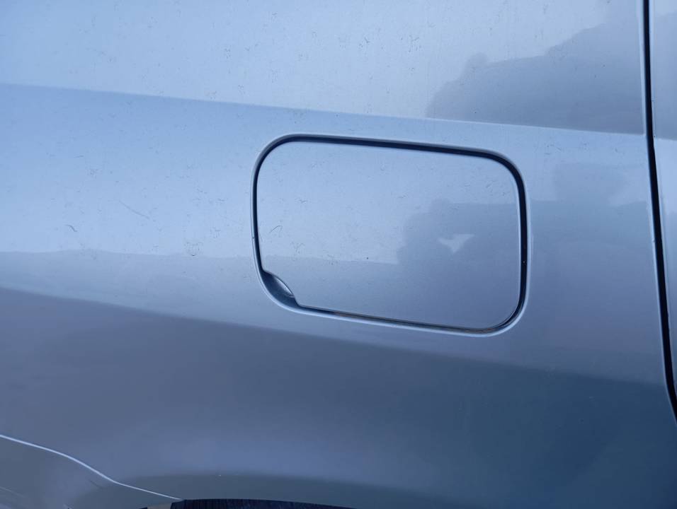 TAPA EXTERIOR COMBUSTIBLE