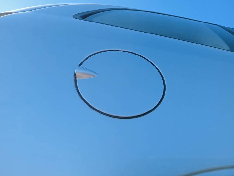 TAPA EXTERIOR COMBUSTIBLE
