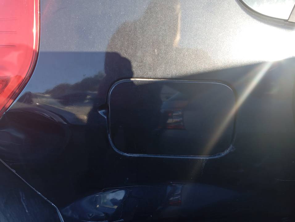 TAPA EXTERIOR COMBUSTIBLE