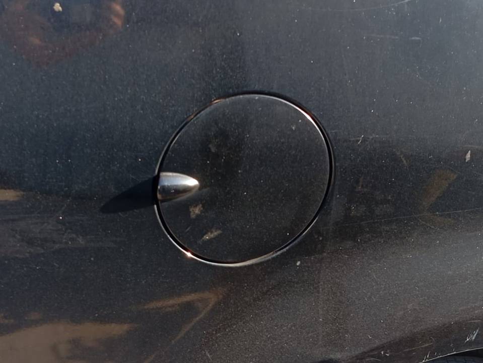 TAPA EXTERIOR COMBUSTIBLE