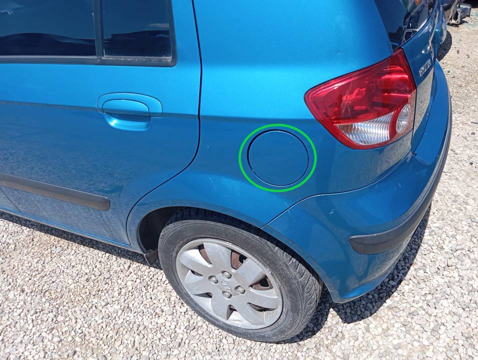 TAPA EXTERIOR COMBUSTIBLE