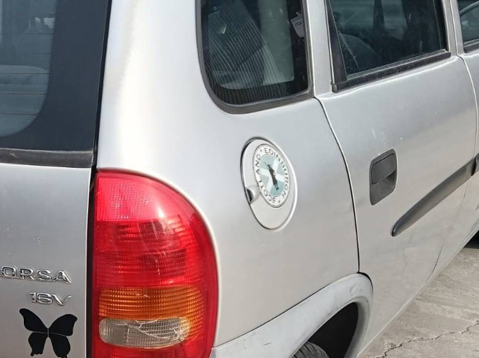 TAPA EXTERIOR COMBUSTIBLE