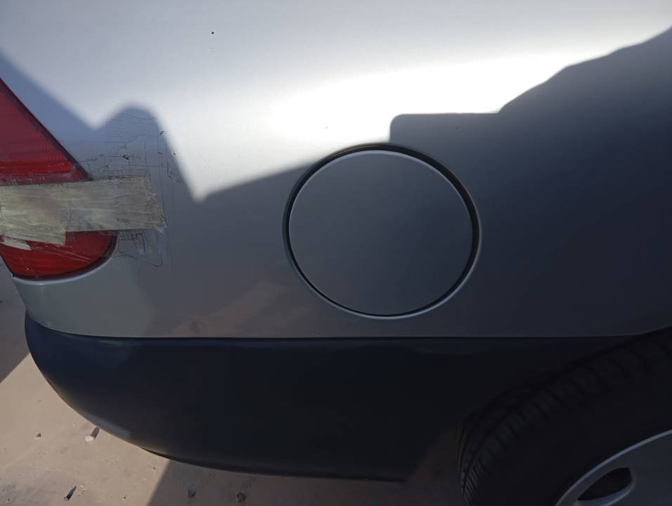TAPA EXTERIOR COMBUSTIBLE