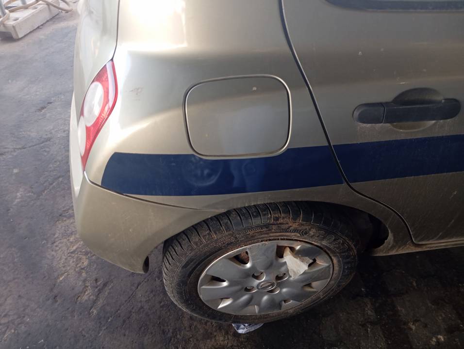 TAPA EXTERIOR COMBUSTIBLE