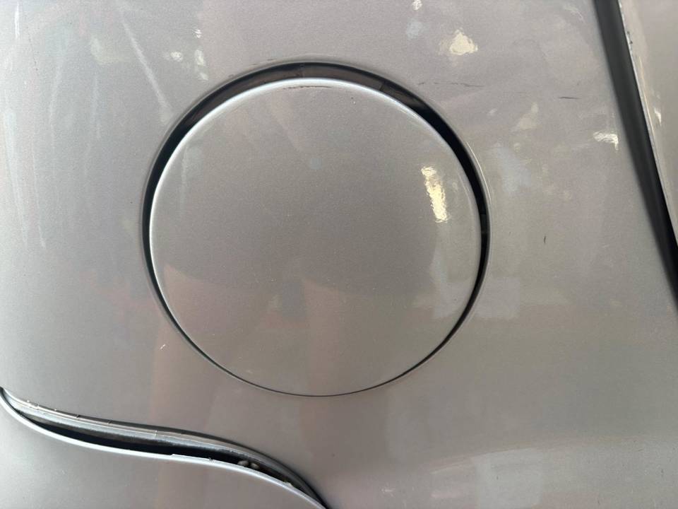 TAPA EXTERIOR COMBUSTIBLE