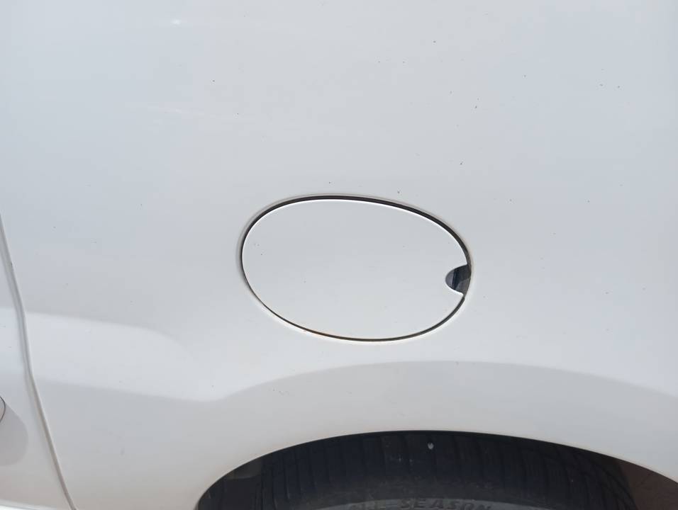 TAPA EXTERIOR COMBUSTIBLE