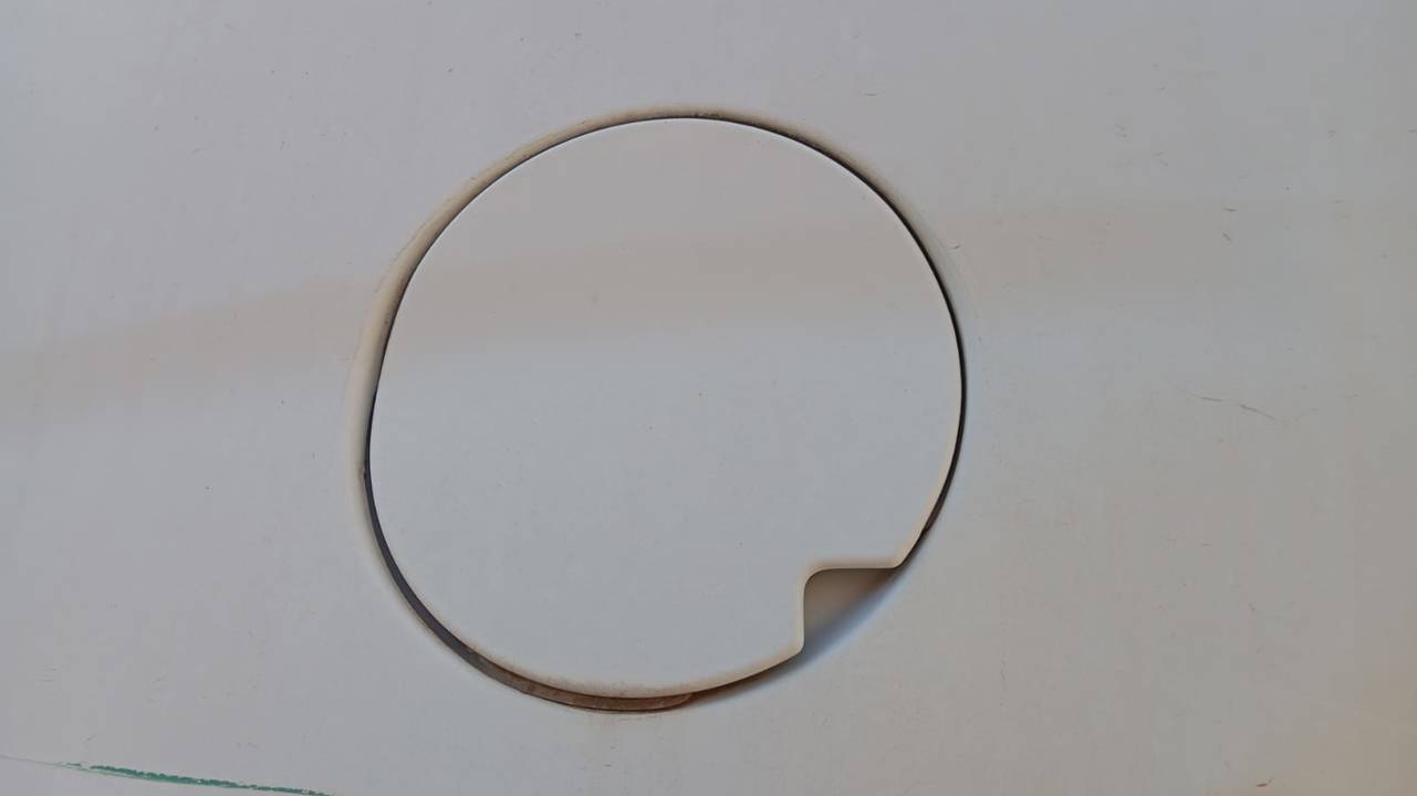 TAPA EXTERIOR COMBUSTIBLE