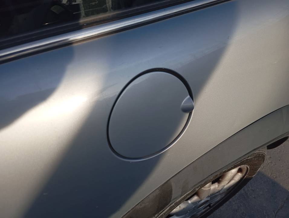TAPA EXTERIOR COMBUSTIBLE