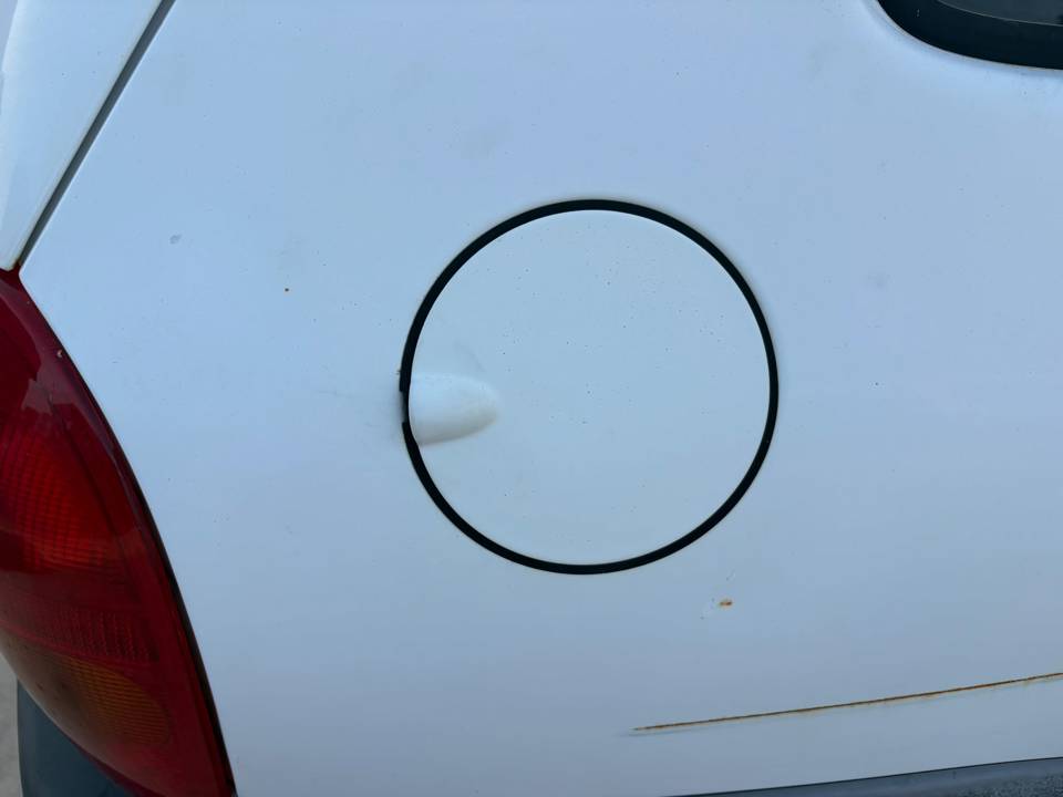 TAPA EXTERIOR COMBUSTIBLE