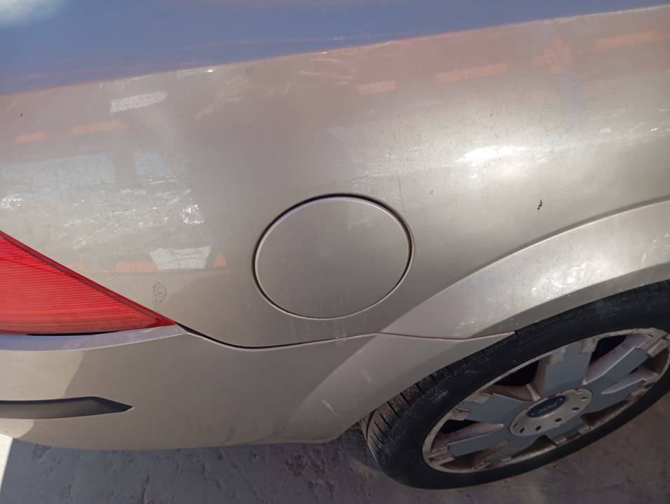 TAPA EXTERIOR COMBUSTIBLE