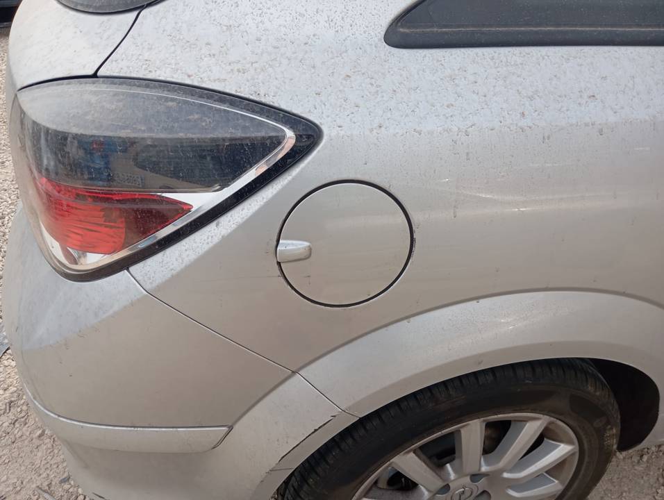 TAPA EXTERIOR COMBUSTIBLE