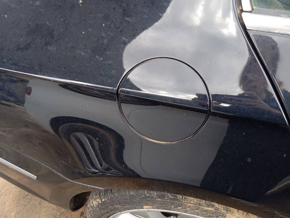 TAPA EXTERIOR COMBUSTIBLE