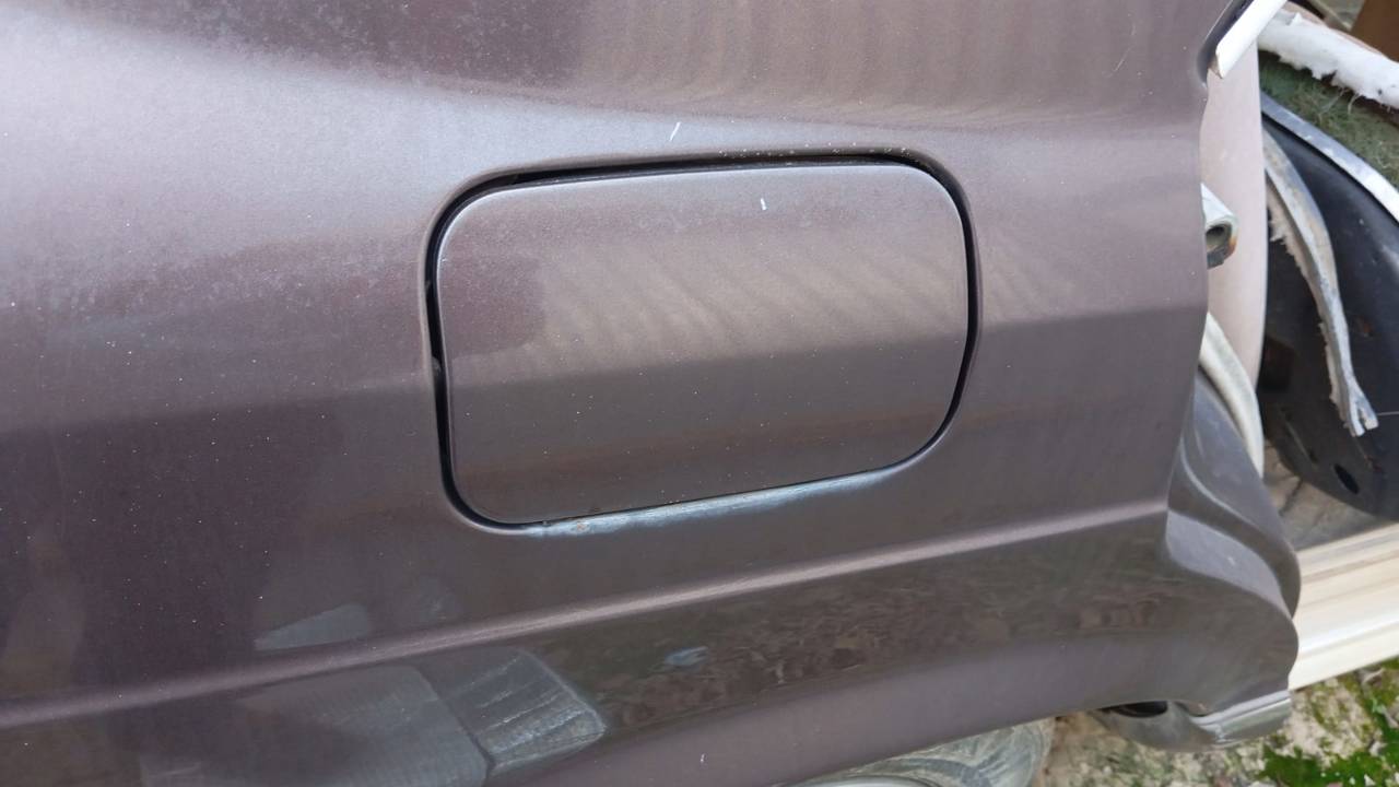 TAPA EXTERIOR COMBUSTIBLE